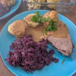 Sauerbraten with bread dumplings and red cabbage