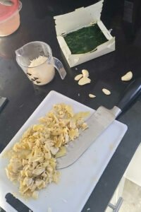 Chopping the artichokes and spinach