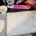 Cream Cheese on the rolled out dough.