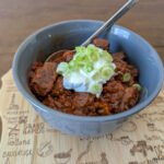 Traditional German Goulash with Sour Cream and Green Onions