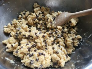 Adding the chocolate chips to the dough
