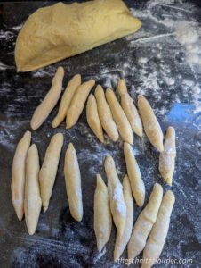 Shaping the noddles for authentic swabian Schupfnudeln