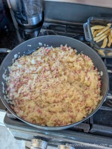 Sauteeing the Sauerkraut and Ham for authentic Swabian Schupfnudeln